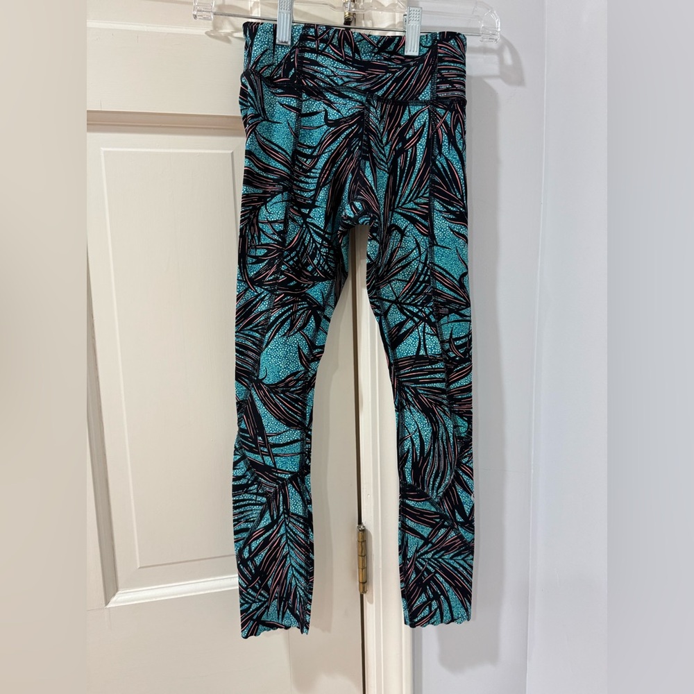 Lululemon sz 2 green and pink palm pattern leggings.
